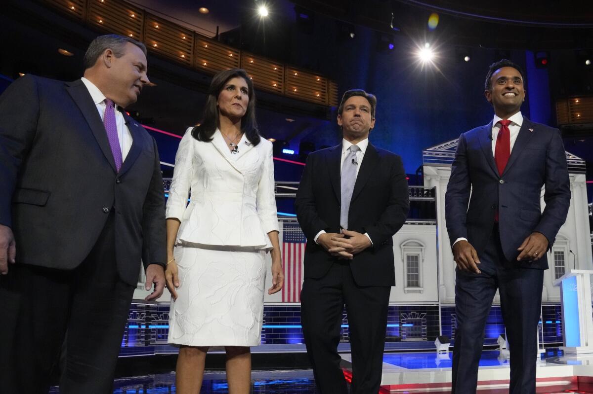 Republican presidential candidates from left, former New Jersey Gov. Chris Christie, former UN Ambassador Nikki Haley, Florida Gov. Ron DeSantis, and businessman Vivek Ramaswamy stand on stage before a Republican presidential primary debate hosted by NBC News on  November 8, 2023, at the Adrienne Arsht Center for the Performing Arts of Miami-Dade County in Miami. — AP file