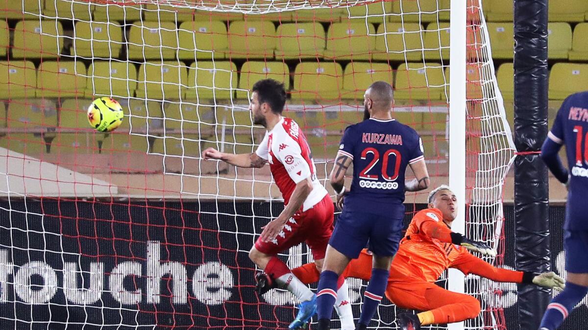 Monaco's Spanish midfielder Cesc Fabregas (L) scored a late winner for his side from the penalty spot.