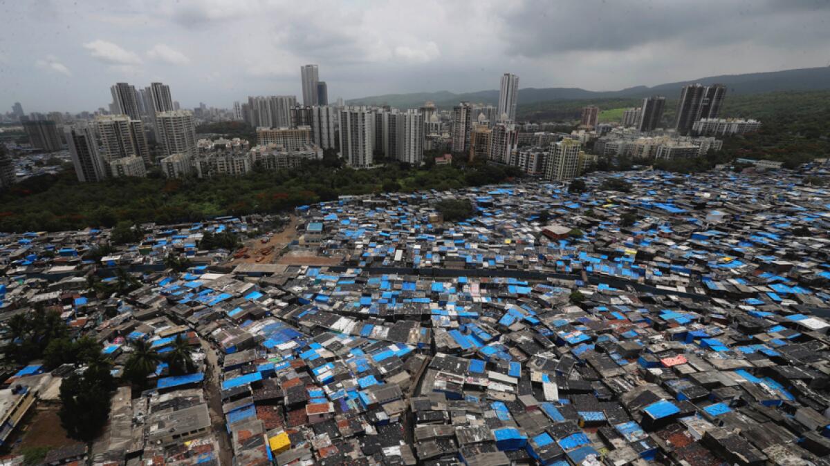A general view of a slum area, some of which are containment zones, in Mumbai, India, Sunday, June 28, 2020. Photo: AP