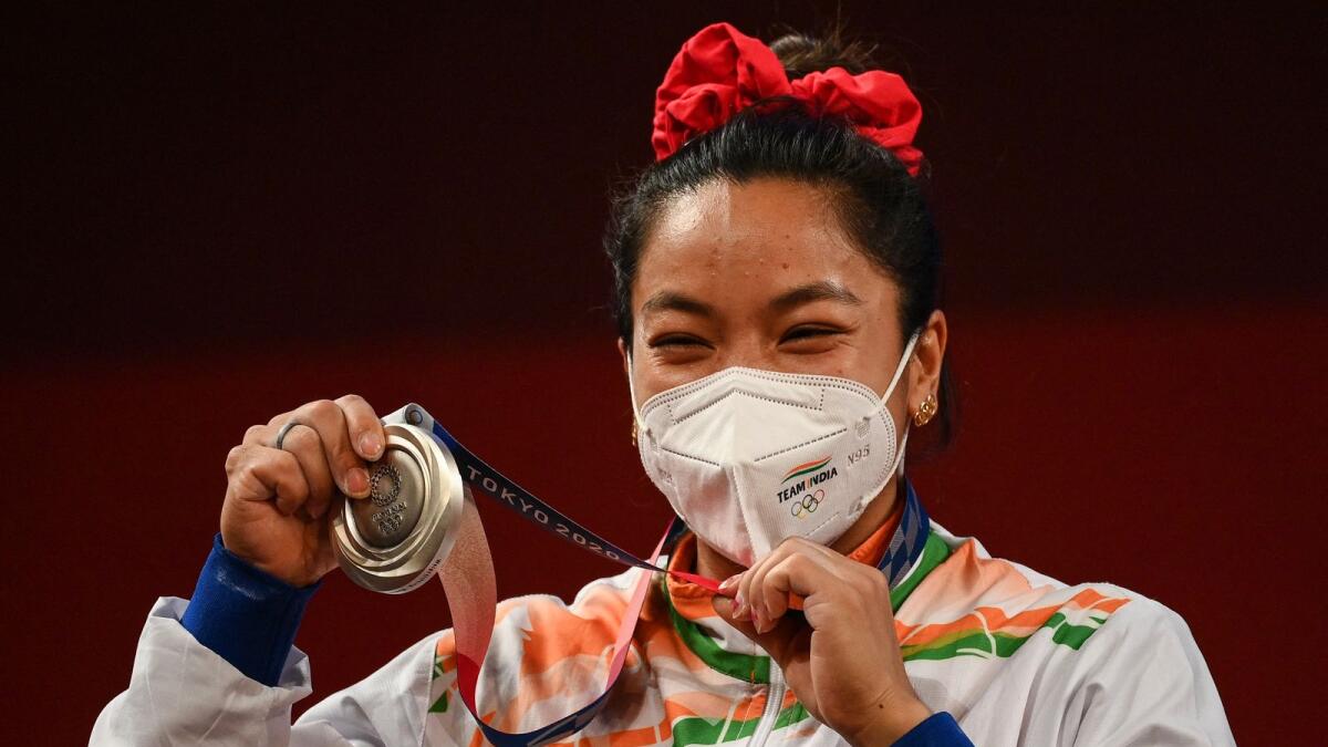 Silver medallist Mirabai Chanu of India during the victory ceremony. (AFP)
