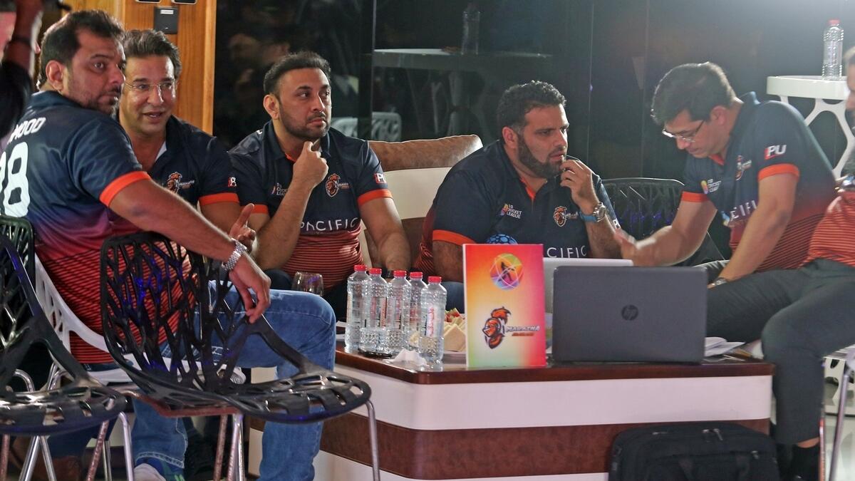 Wasim Akram with the Maratha Arabian think-tank during the players draft for the first ever T10 Cricket League on board the Lotus Yacht at the Dubai Marina