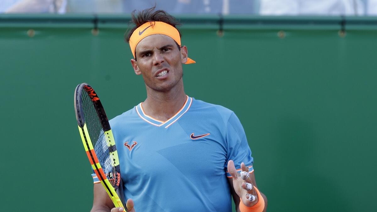 Djokovic knocked out as lucky Nadal battles on in Monte Carlo
