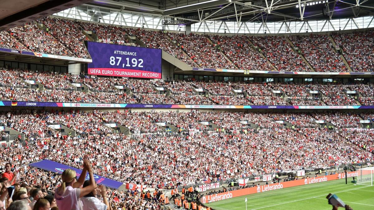 A screen shows the attendance during the Women's Euro 2022 final. — AP