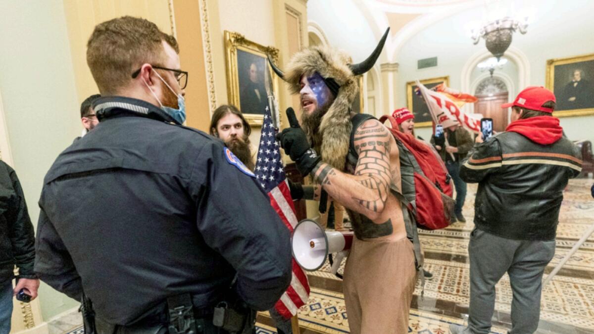 Jacob Chansley during the siege of US Capitol. — AP