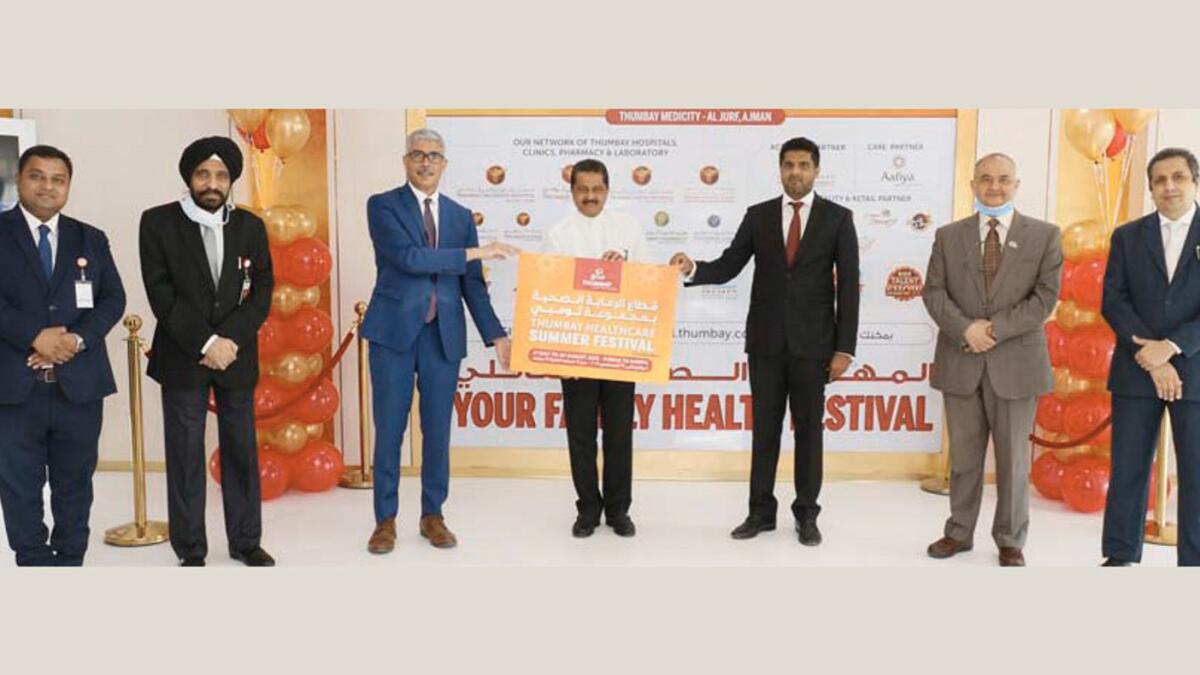 Dr Thumbay Moideen and Akbar Moideen Thumbay, along with other delegates, at the opening ceremony for the Thumbay Healthcare Summer Festival. — Supplied photo