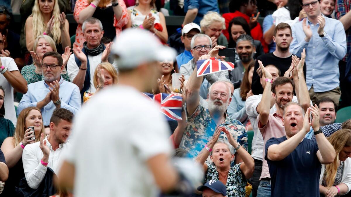 Fans of Britain's Jack Draper react during his first round match against Serbia's Novak Djokovic. — Reuters