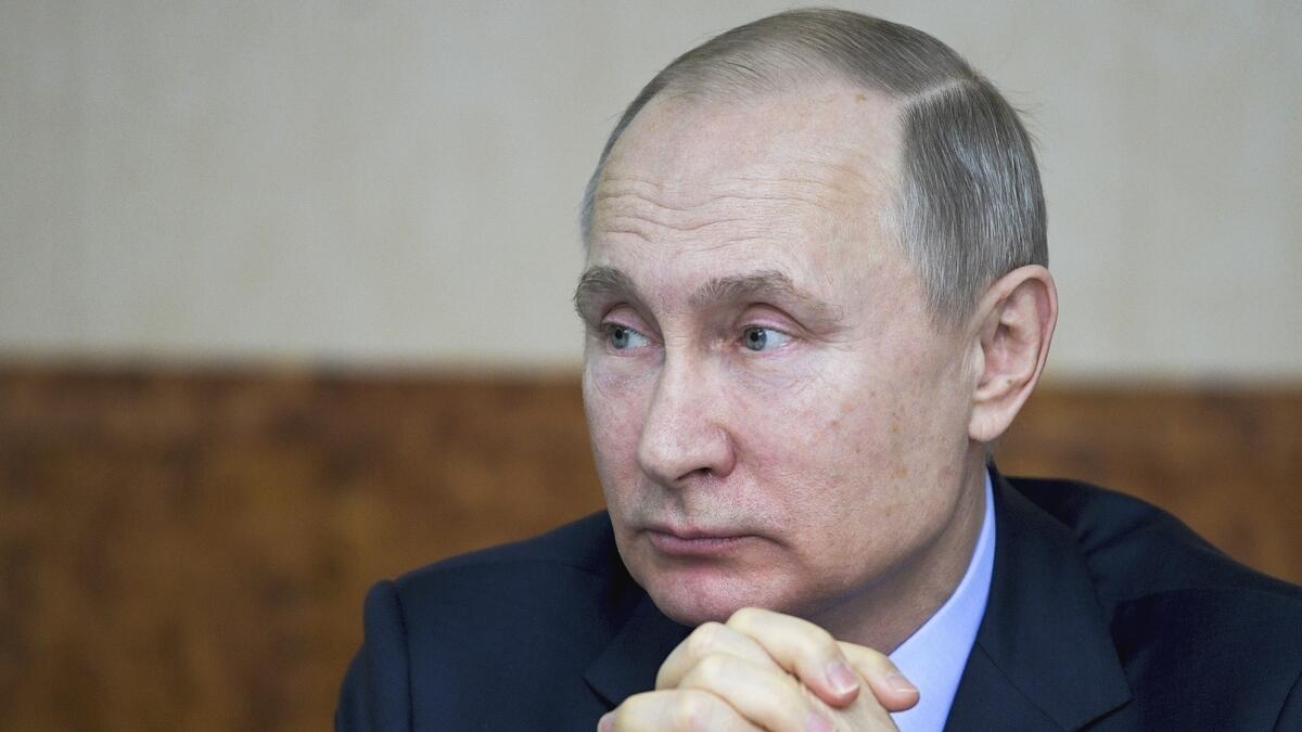Russian President Vladimir Putin attends a meeting.- AP
