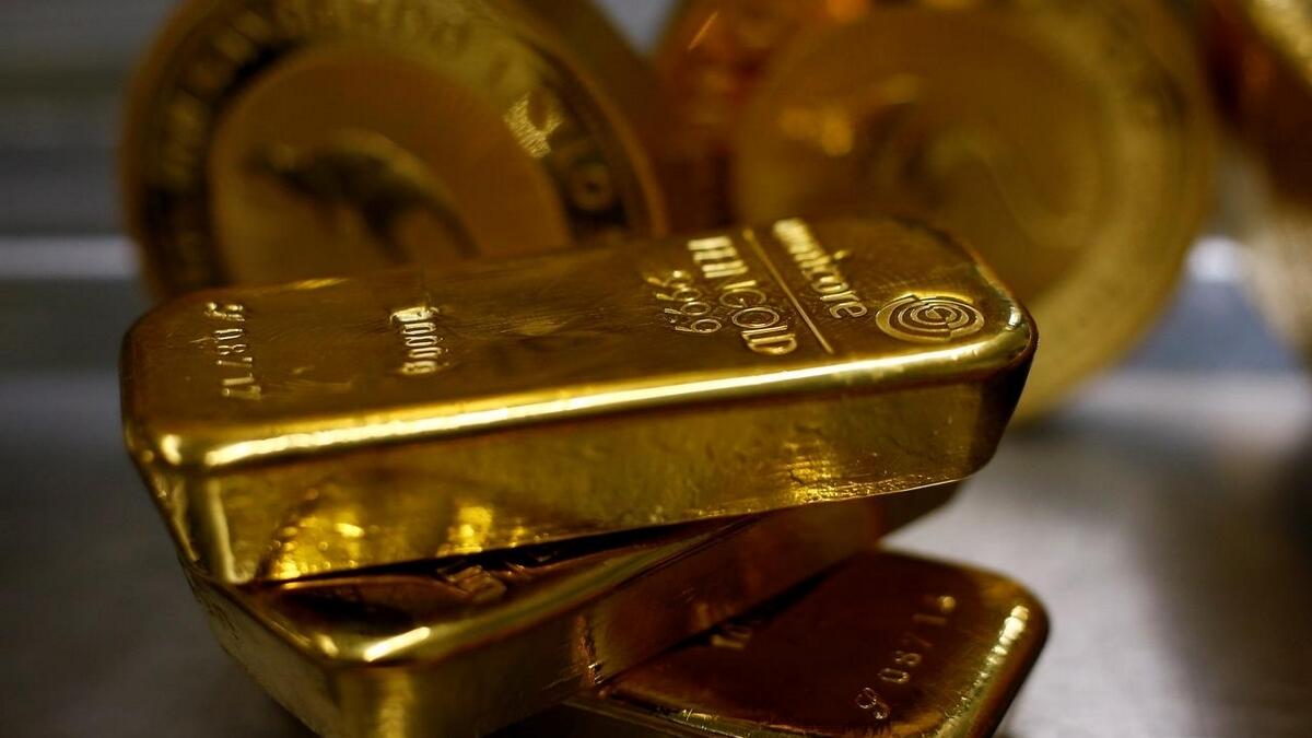 Spot gold was up 0.1 per cent at $1,874.21 per ounce. - Reuters