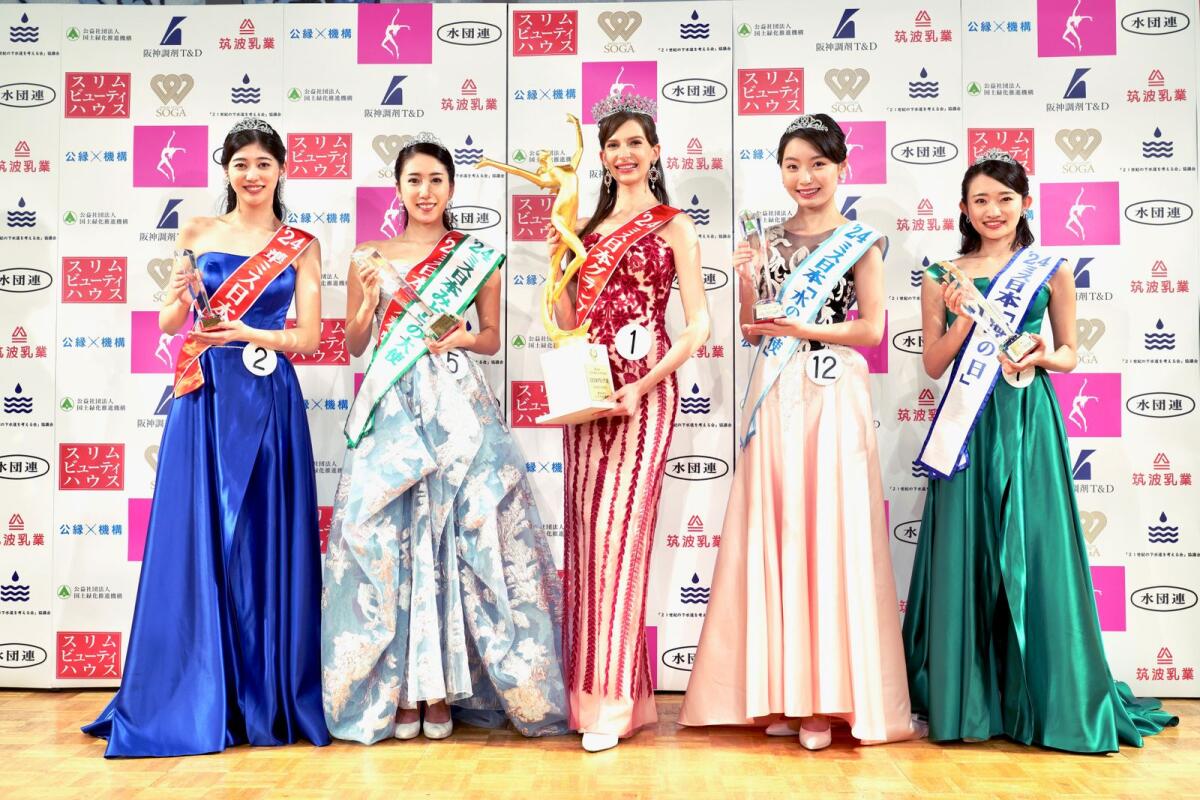 Contestants including Carolina Shiino, who won the Miss Nippon (Japan) Grand Prix, centre, pose for a photo after the contest in Tokyo on Jan. 22, 2024. — AP file