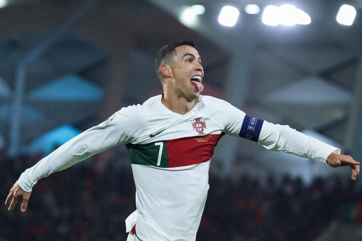 Portugal forward Cristiano Ronaldo celebrates after scoring his team's first goal against Luxembourg. — AFP