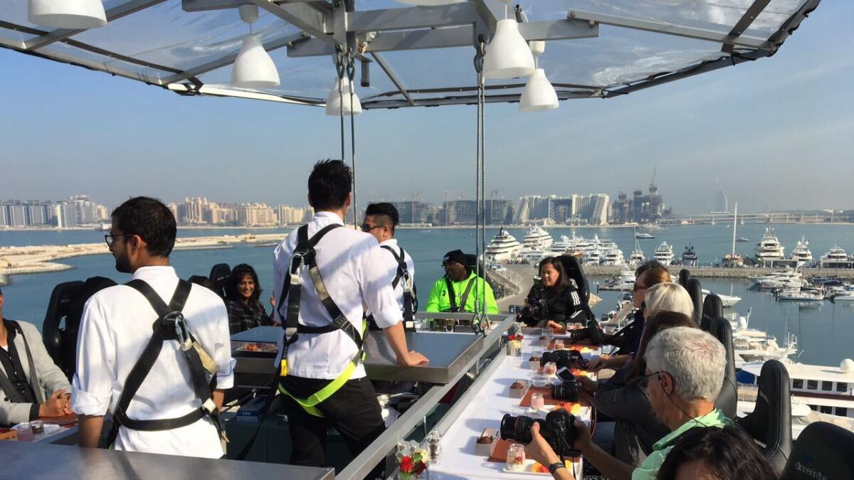 Popular dinner concept 'Dinner in the Sky' has come to Dubai International Marine Club. Never complain about 'ambience' ever again. Photo by Rahul Gajjar