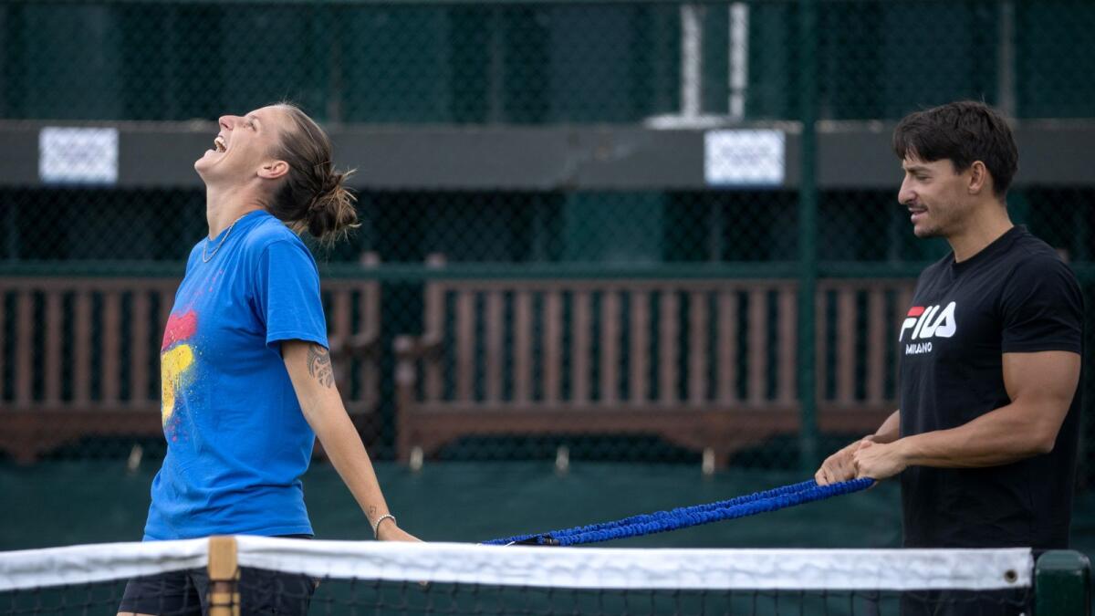 Karolina Pliskova and husband Michal Hrdlicka during a practice session. — Reuters