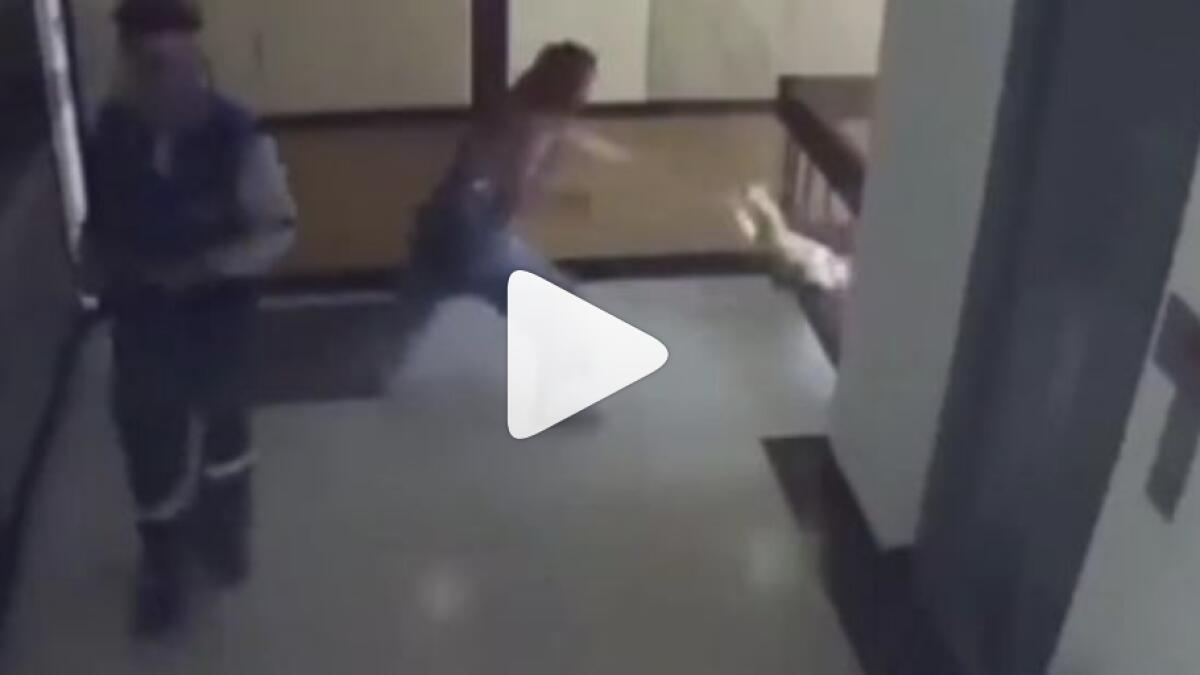 Video: Mother saves child from near fatal fall from building