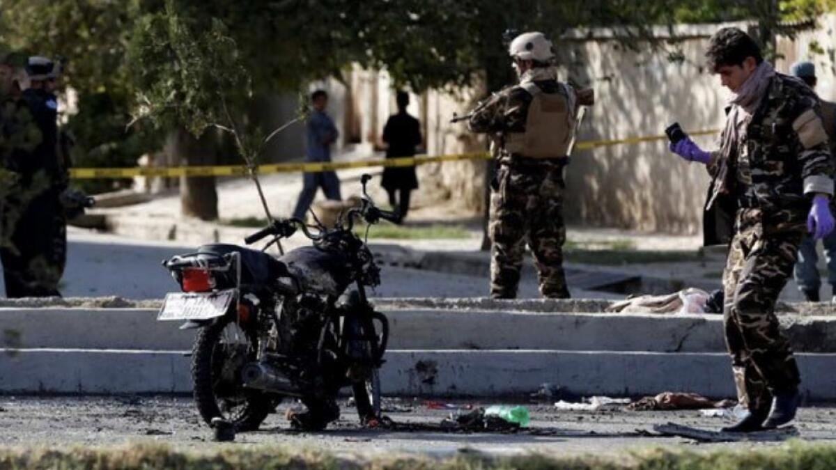 Student killed in twin blasts near Afghan girls school