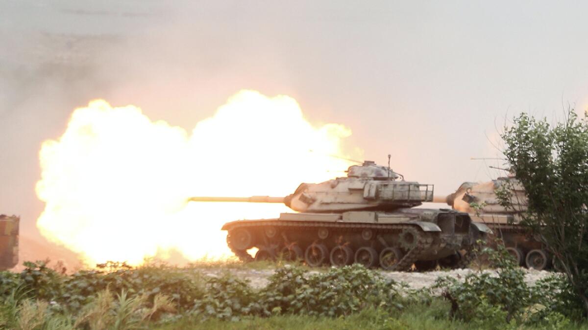 Taiwan's M60A3 Patton main battle tanks fire during the 36th Han Kung military exercises in Taichung City, central Taiwan. Photo: AP