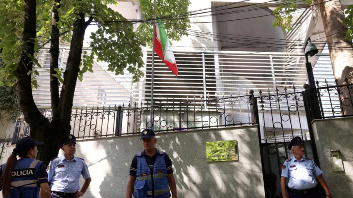 Police guard outside the Iranian Embassy in Tirana, Albania. — AP