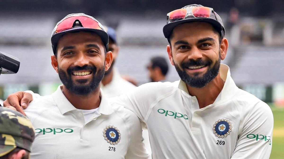 Ajinkya Rahane (left) has cleared the air that Virat Kohli is the undisputed leader of Team India. — AFP