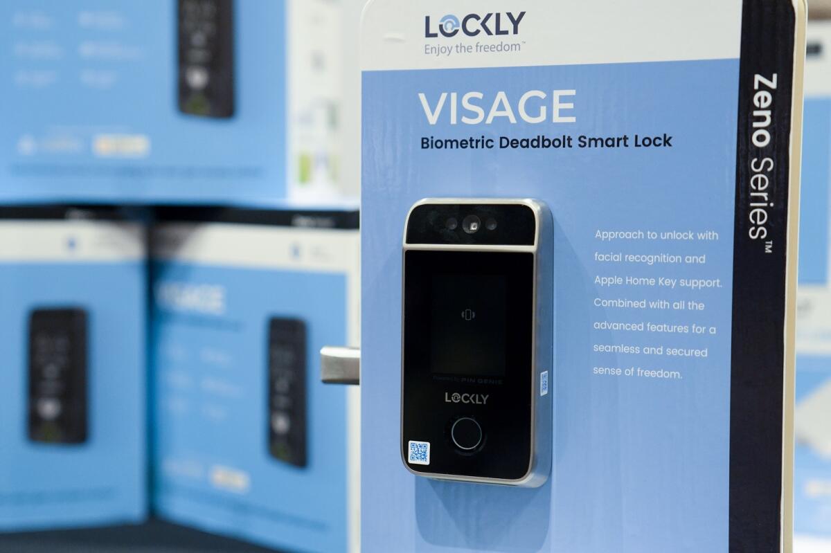The Lockly Visage facial recognition smart lock is on display at Pepcom ahead of the CES tech show in Las Vegas. — AP