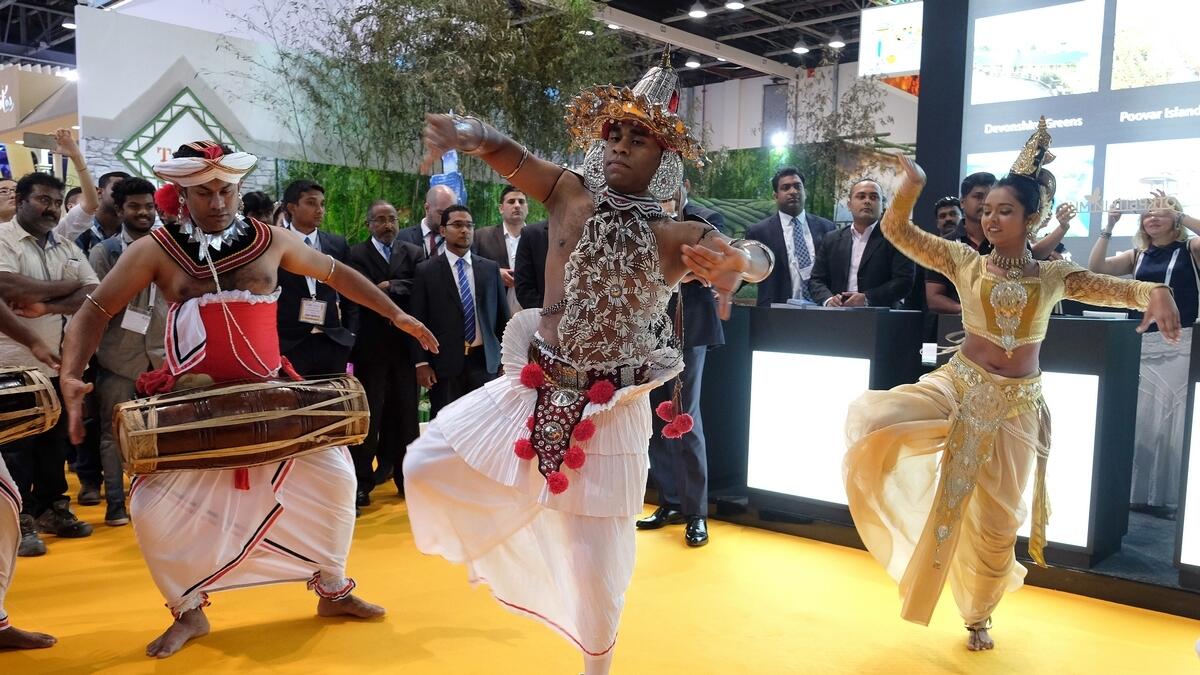 Performers inside Sri Lanka's pavilion at the Arabian Travel Market in Dubai.