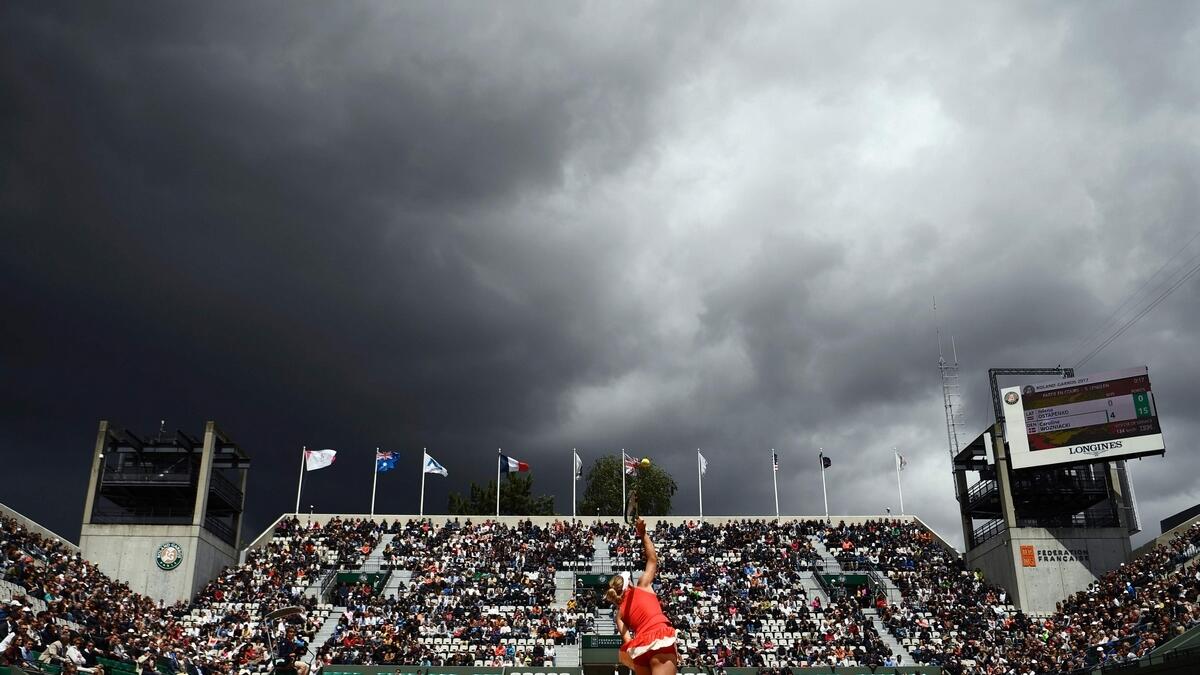 Rain pushes Nadal, Djokovic quarterfinals back to Wednesday