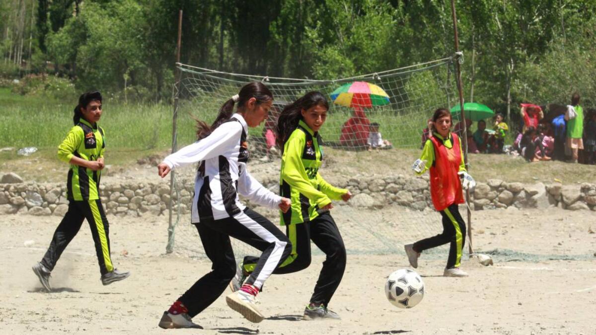 Young women play football in Karimabad, the main town in Pakistan’s Hunza valley.