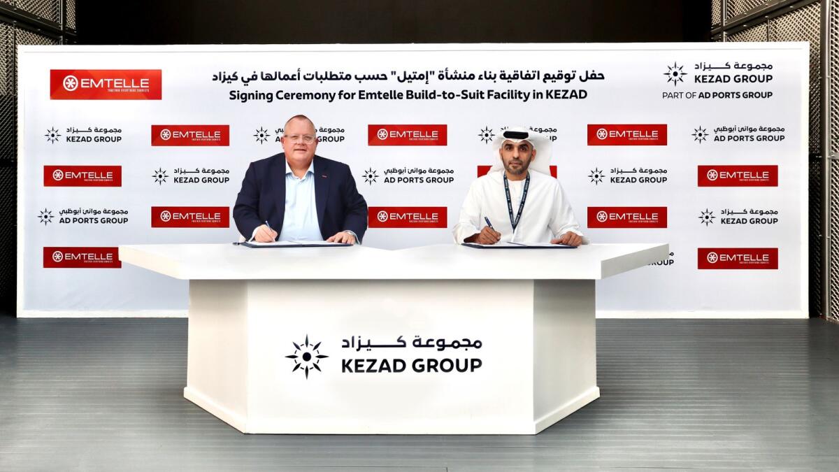 Abdullah Al Hameli, CEO, Economic Cities and Free Zones, AD Ports Group, and Tony Rodgers, CEO, Emtelle at the signing ceremony. — Supplied photo