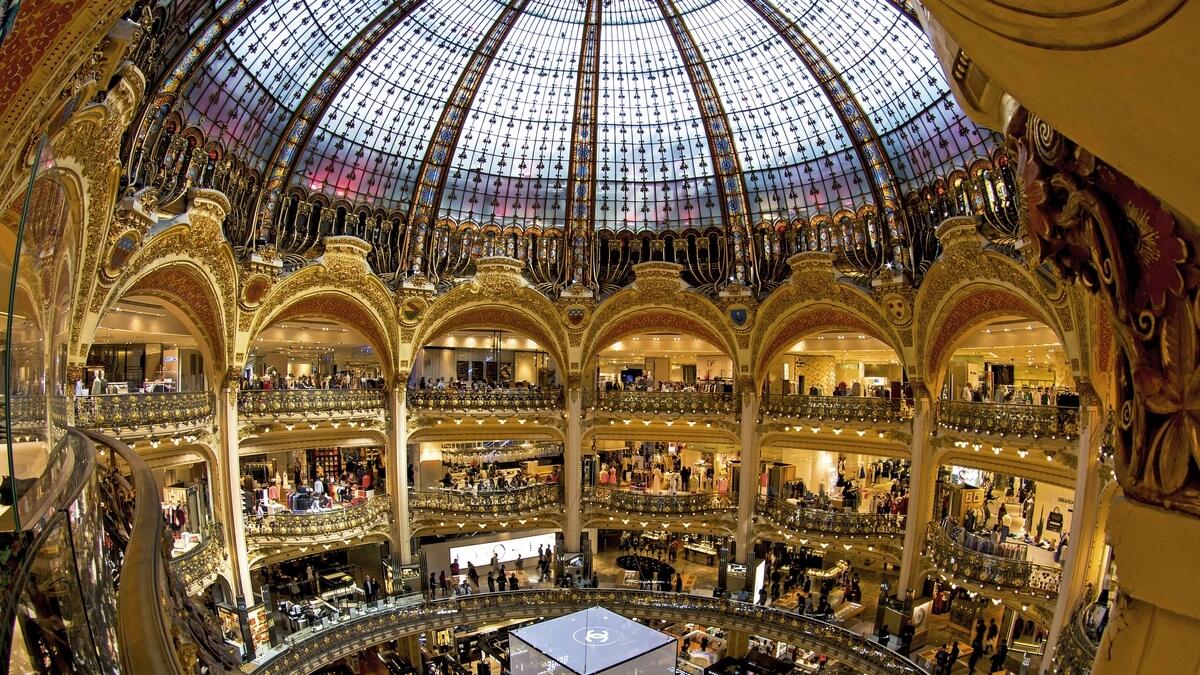 SHOP, SHOP, SHOP: A grand cupola, massive staircases, art nouveau balconies, and five levels made Galeries Lafayette the ultimate destination for fashion