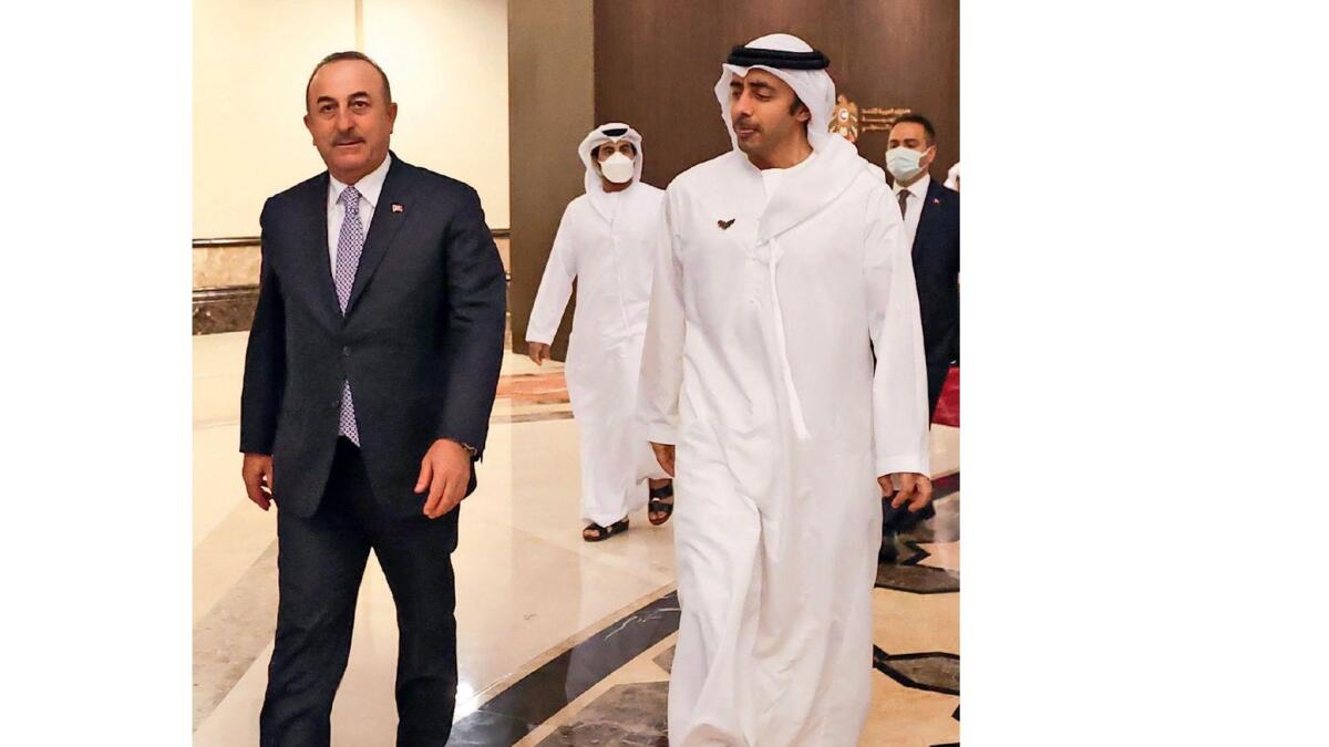 Minister of Foreign Affairs of Republic of Türkiye Mevlüt Çavuşoğlu with UAE Minister of Foreign Affairs and International Cooperation Sheikh Abdullah bin Zayed Al Nahyan in Abu Dhabi in December 2021. —  AFP