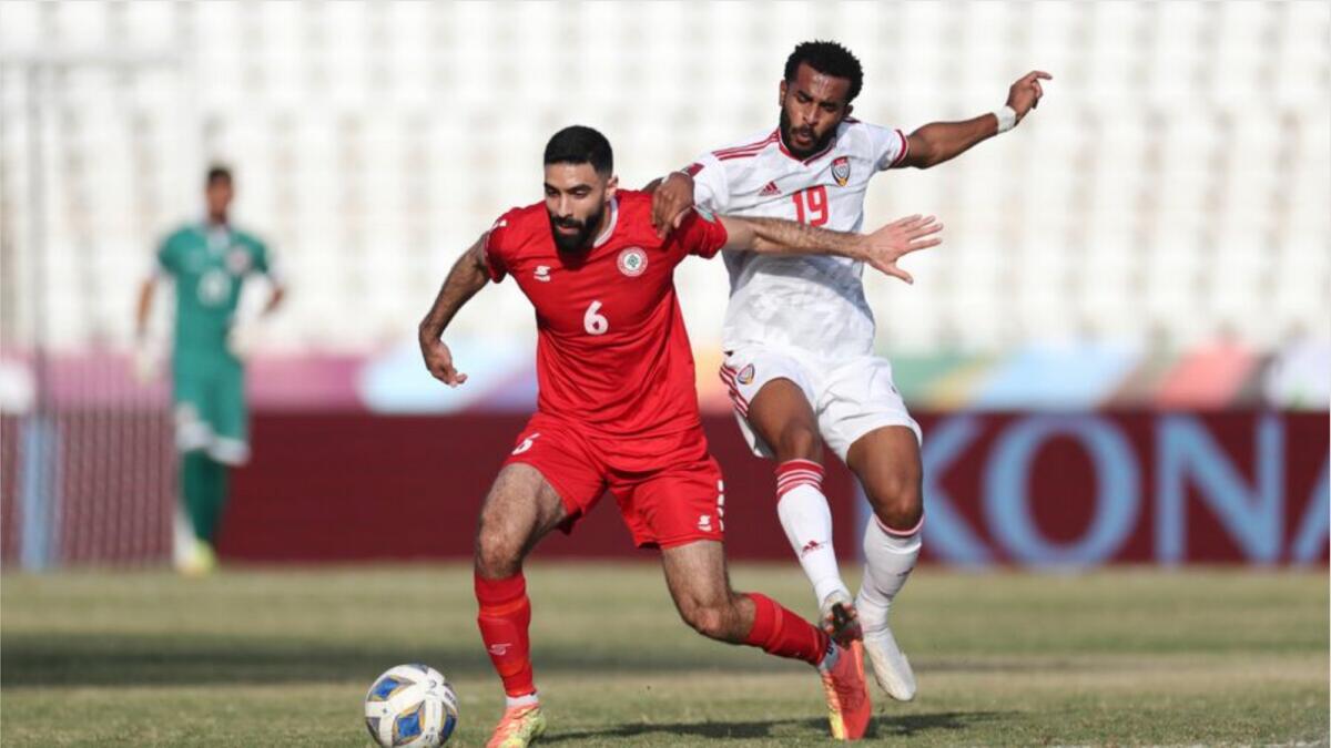 UAE's Tahnoon Al Zaabi (19) vies for the ball with Lebanon's Mouhammed Ali Dhaini. (AFC website)