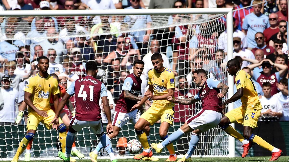 Aston Villa's Danny Ings (second from right) scores during the English Premier League match against Everton at Villa Park in Birmingham on Saturday. — AP