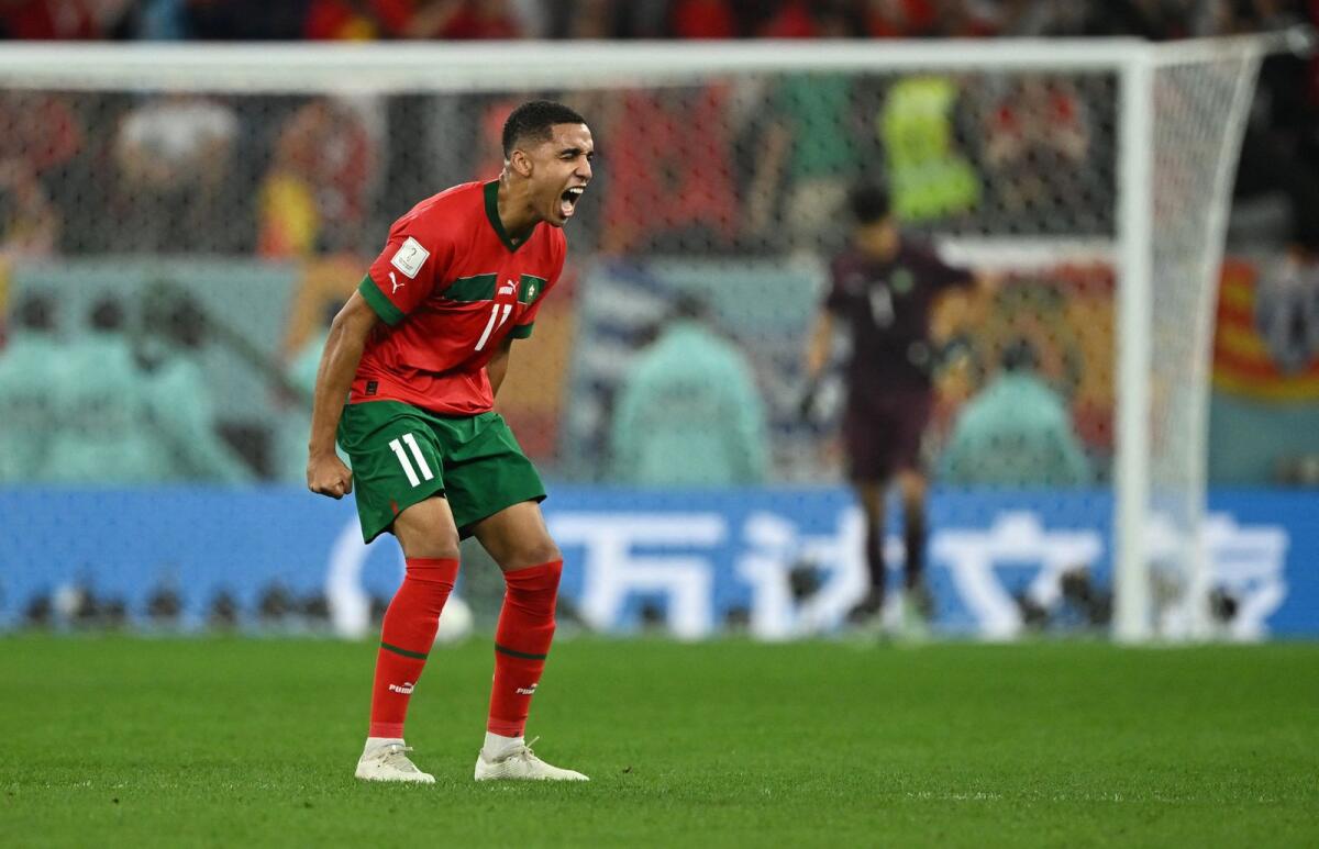 Morocco's Abdelhamid Sabiri celebrates scoring a penalty during the penalty shootout. Photo: Reuters