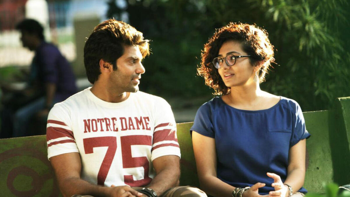 Arya and Parvathy in a scene from Bangalore Naatkal