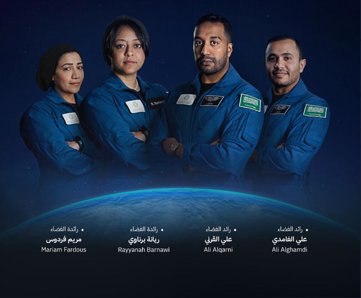 Saudi Arabia's first female astronaut Rayyanah Barnawi (C), male astronaut Ali AlQarni, to travel to space.