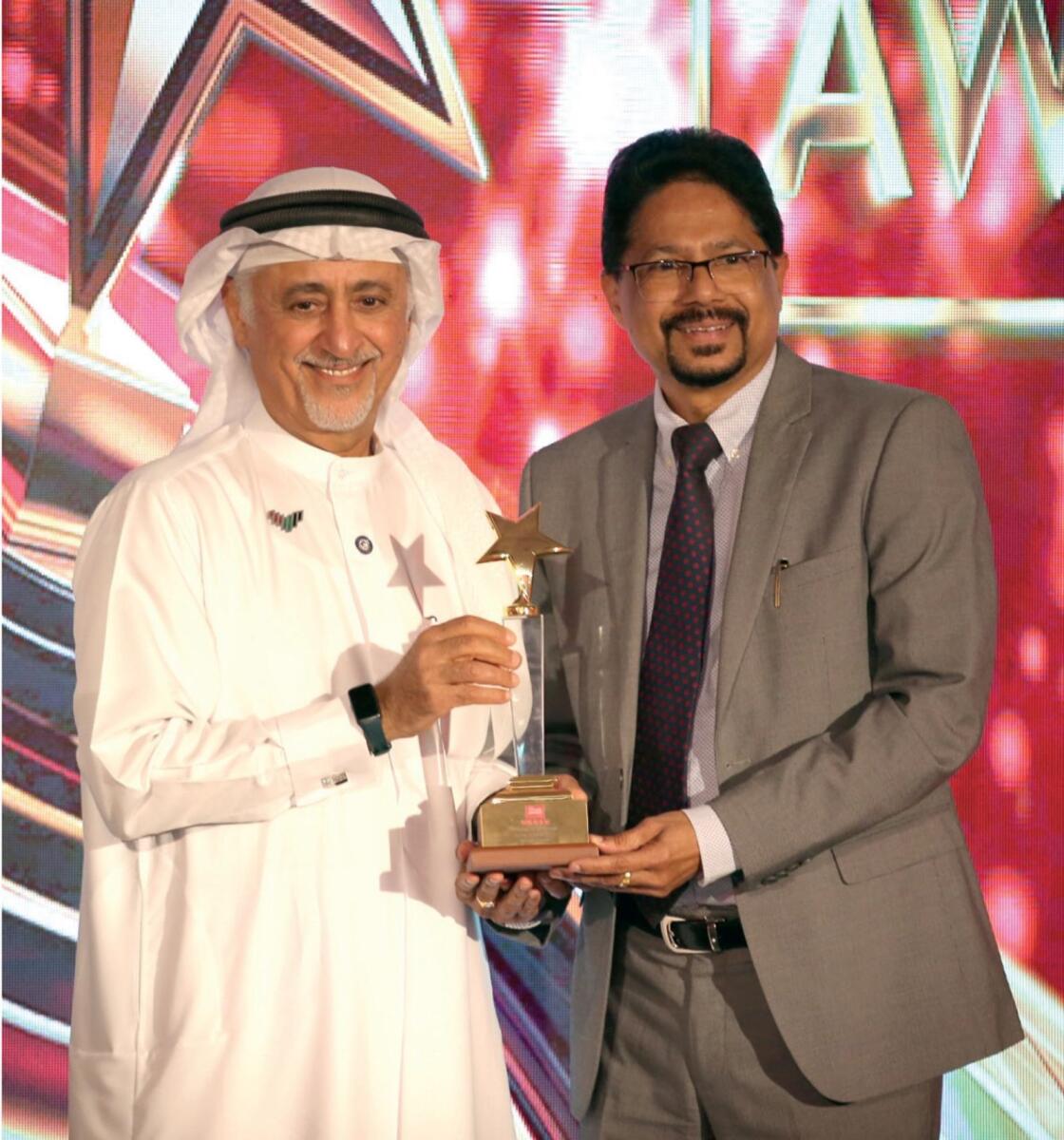 Stanly Abraham, CFO of F&amp;B division of Galadari Brothers, receives the award at the Arab Franchise Award. — supplied photos