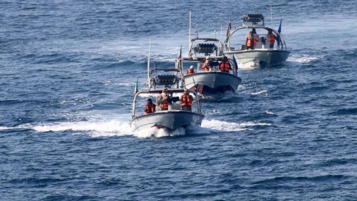 Iran says US navy fires warning shots near its vessels