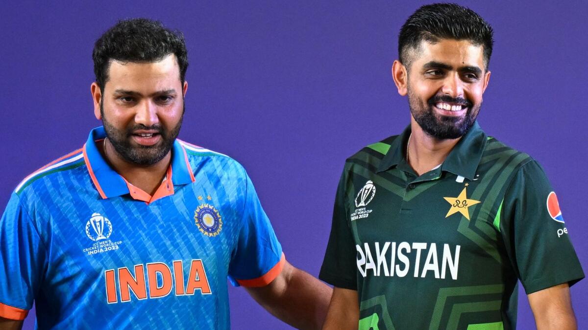 India’s captain Rohit Sharma (left) and his Pakistani counterpart Babar Azam attend the Captains’ Day event at the Narendra Modi Stadium in Ahmedabad on Wednesday. — AFP