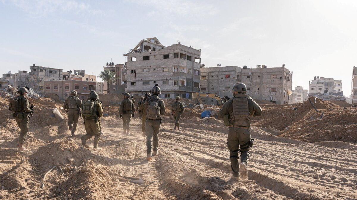 Israeli soldiers operate in the Gaza Strip. — Reuters