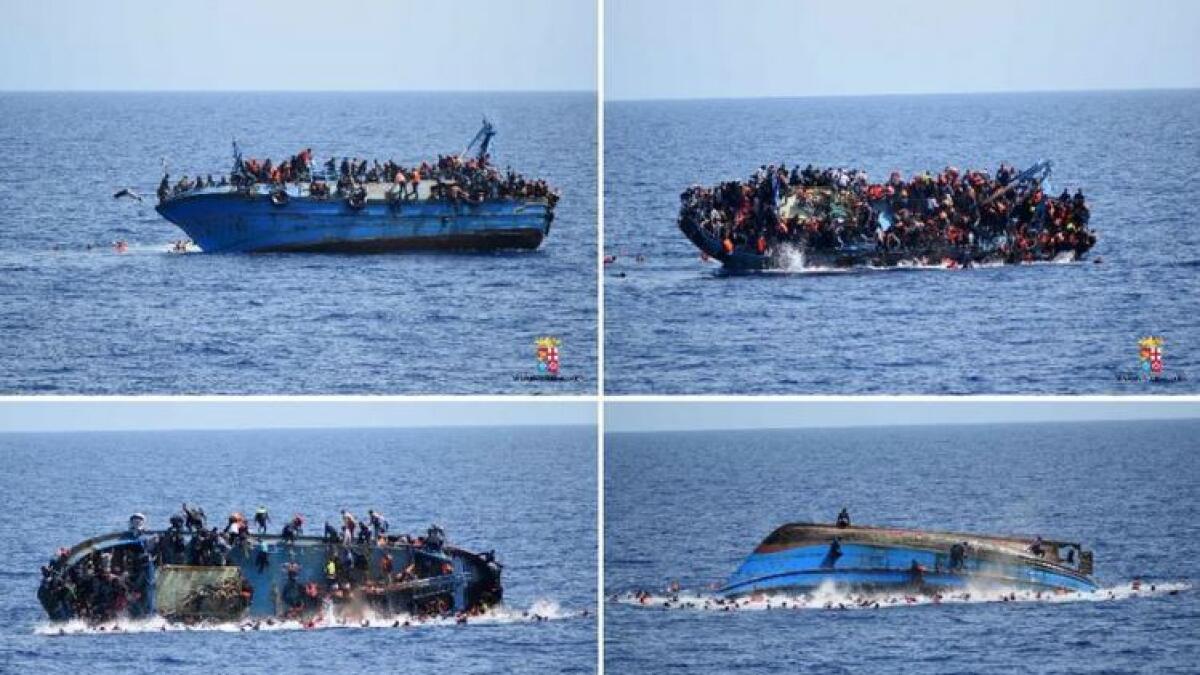 Striking pictures capture moment of migrant shipwreck off Libya