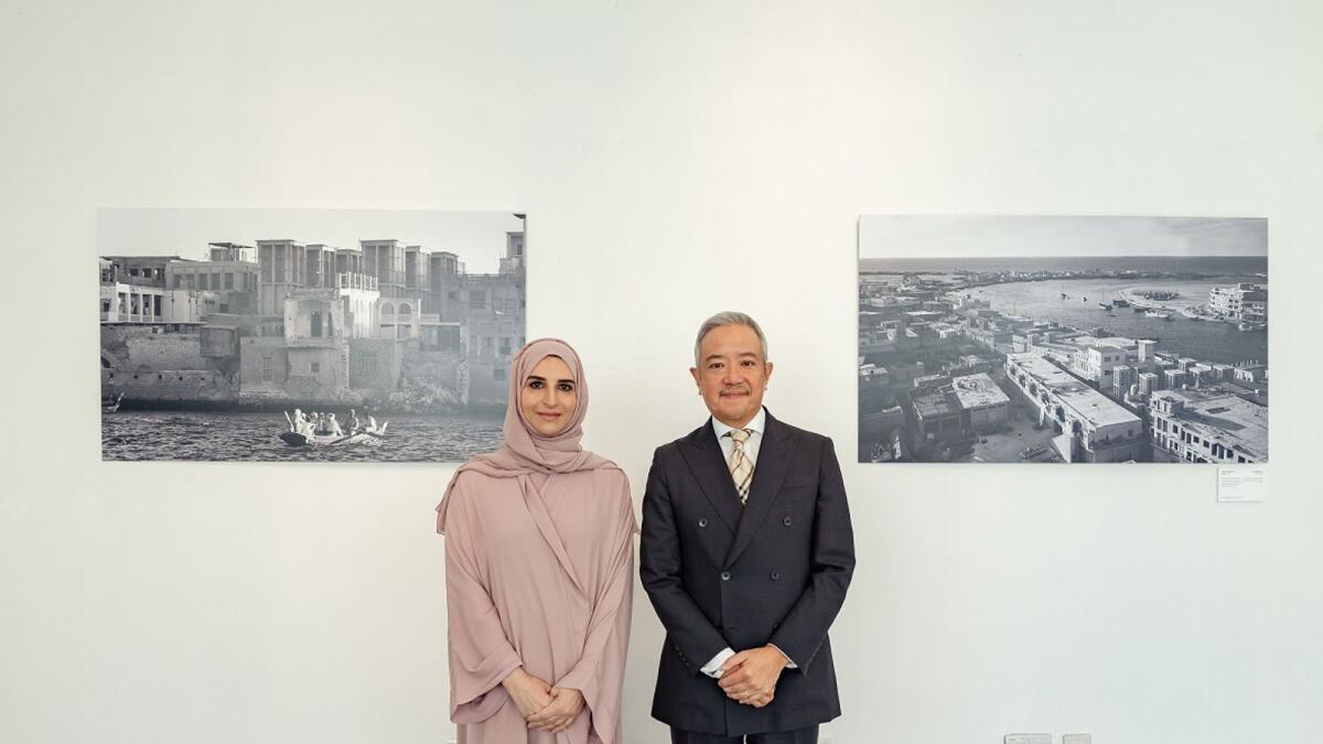 Hala Badri with Noboru Sekiguchi, Consul-General of Japan in Dubai and the Northern Emirates, during the 'Dubai in the Year 1962' photo exhibition at Al Safa Art and Design Library
