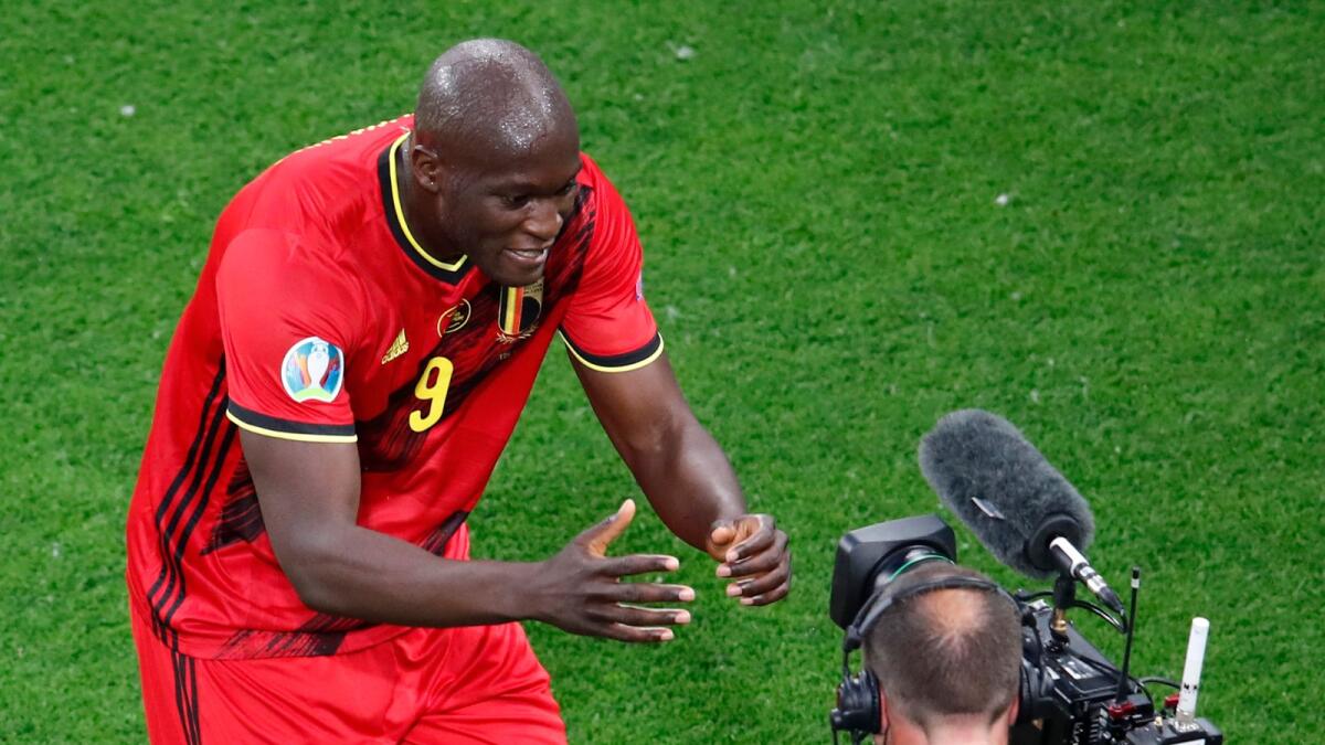 After scoring the first goal, Romelu Lukaku headed to a television camera and grabbed it with both hands, saying “Chris, Chris, I love you.” (AP)