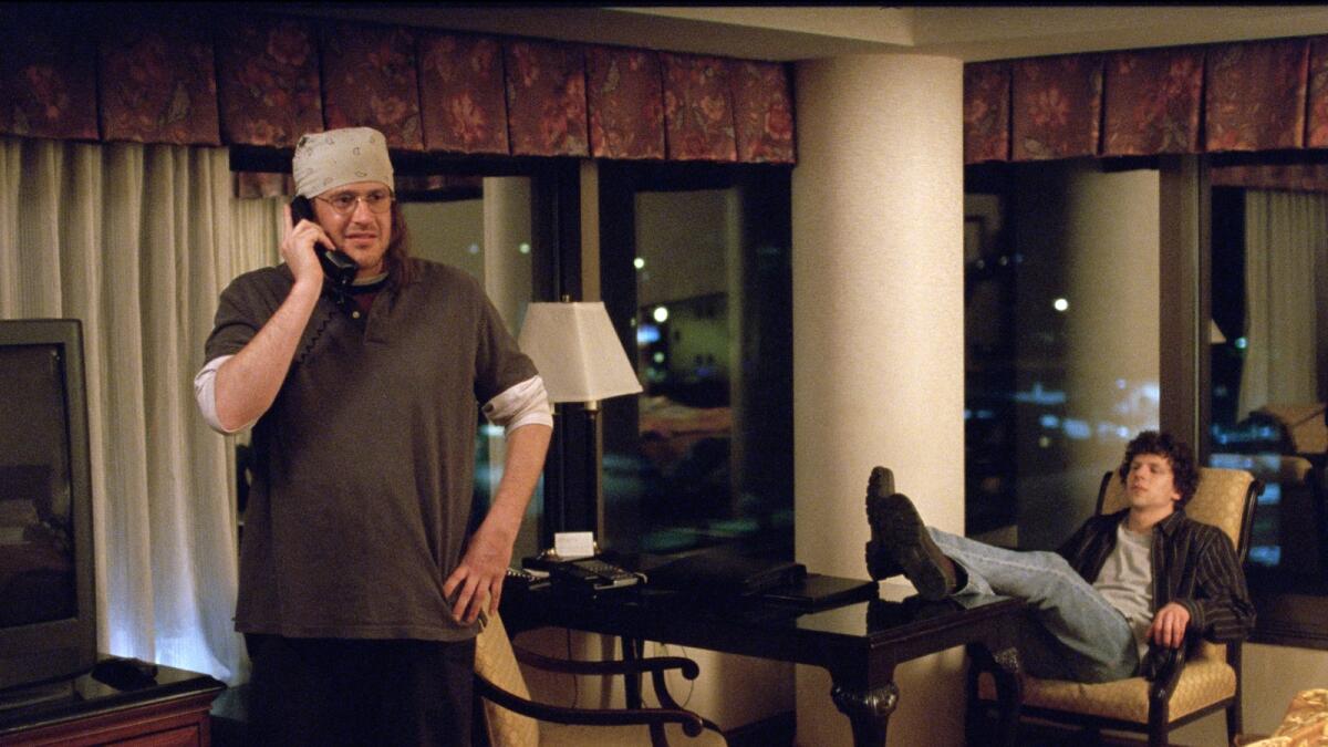 Jason Segel (playing David Foster Wallace) and Jesse Eisenberg in a scene from the The End of The Tour.
