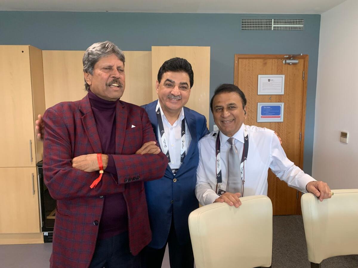 Ajay Sethi with Sunil Gavaskar and Kapil Dev in the radio commentary box. — Supplied photos