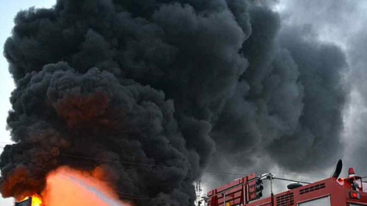 fire, oil depot, karachi