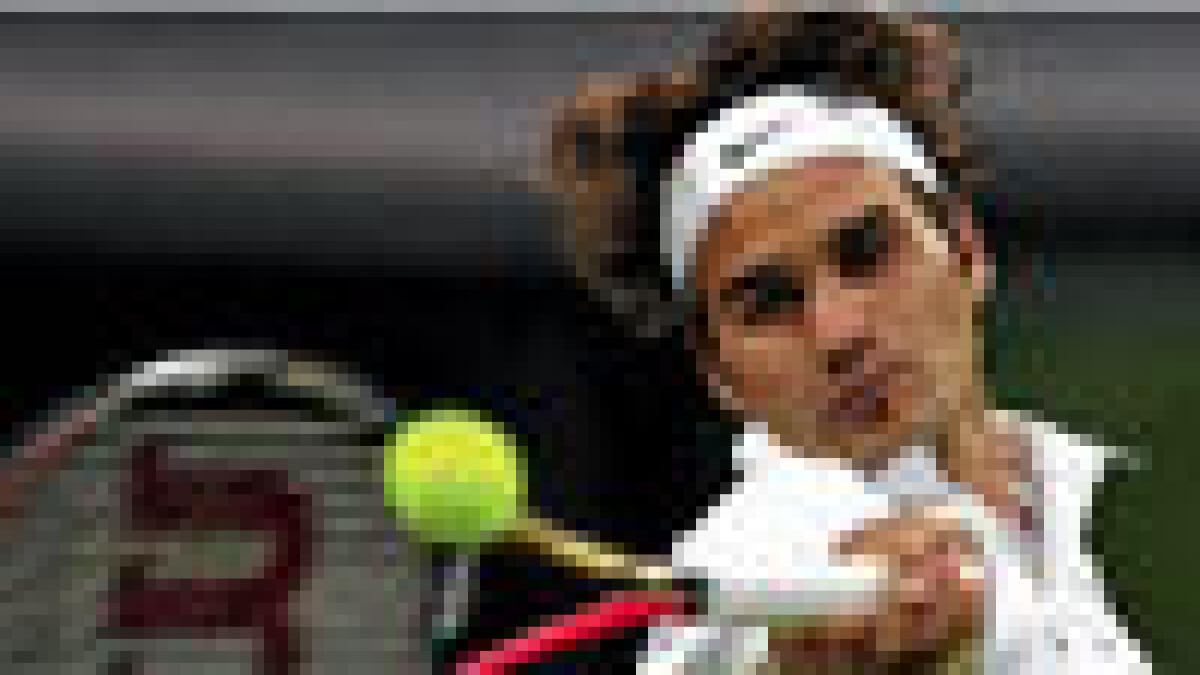 Federer downs Nalbandian to reach Wimbledon last 16