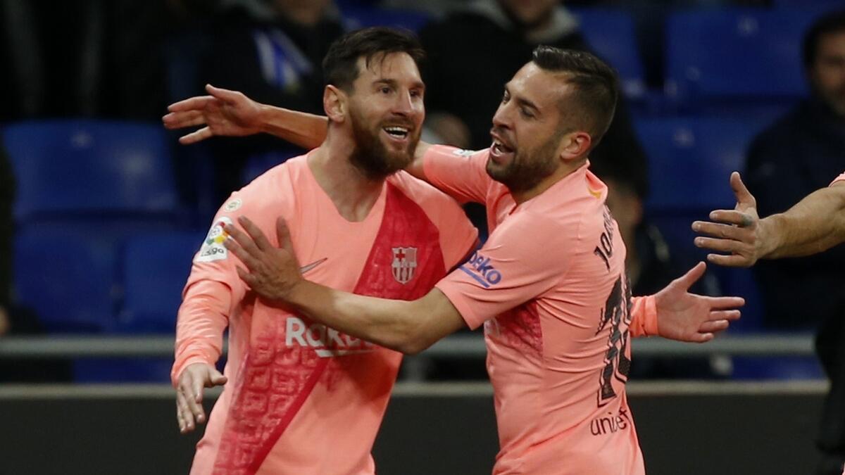 Messi keeps Barca top