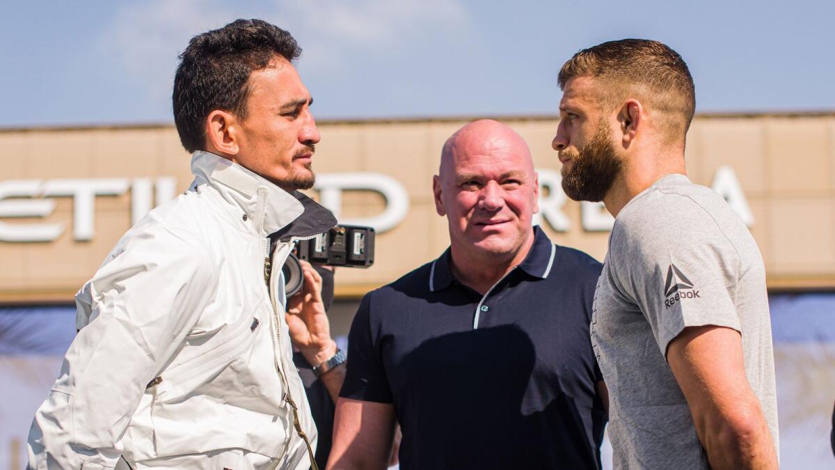 Max Holloway and Calvin Kattar face off outside Etihad Arena ahead of their clash on UFC Fight Island. (Supplied photo)