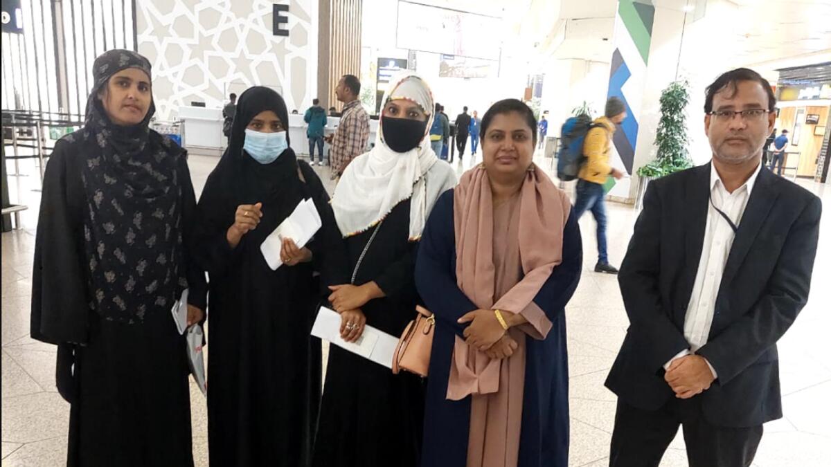 Officials of the Indian Embassy in Riyadh with the female workers. — Photo: Twitter