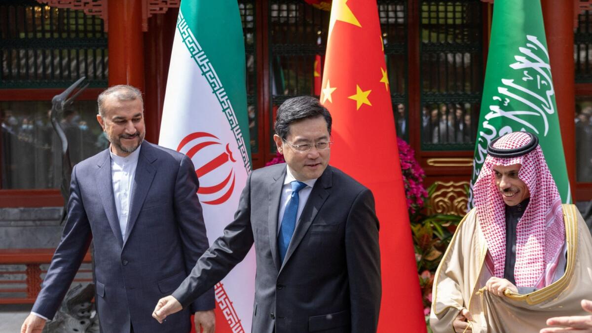Iranian Foreign Minister Hossein Amir-Abdollahian, Saudi Arabia's Foreign Minister Prince Faisal bin Farhan Al Saud and Chinese Foreign Minister Qin Gang during their meeting in Beijing. — Reuters