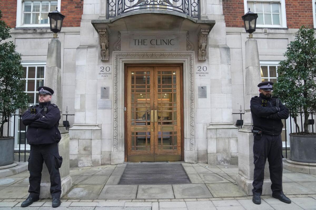 Police officers stand guard outside The London Clinic where Kate, Princess of Wales is recovering from surgery, in London on January 17, 2024. — AP file