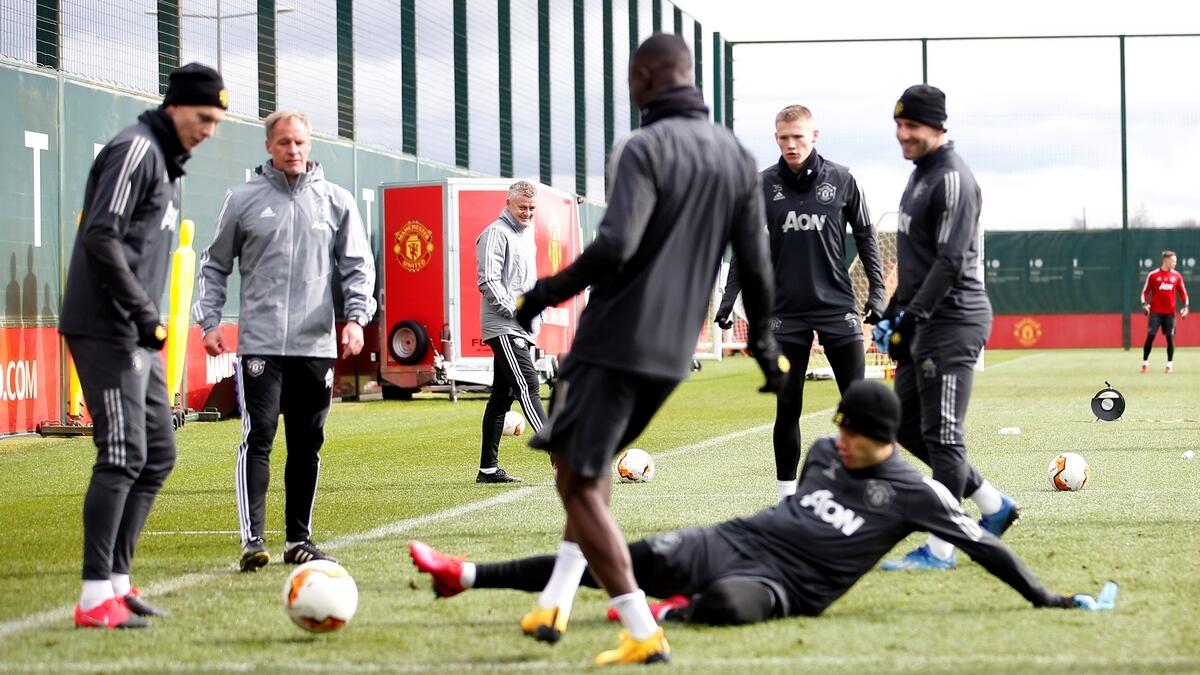 Manchester United players during a training session (Reuters)